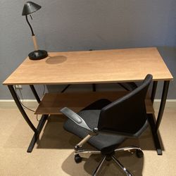 Desk, Pneumatic Chair and Lamp.