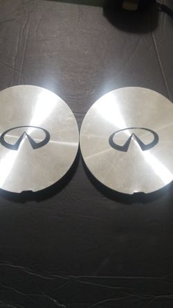 2 Infiniti center caps 5"7/8 diameter