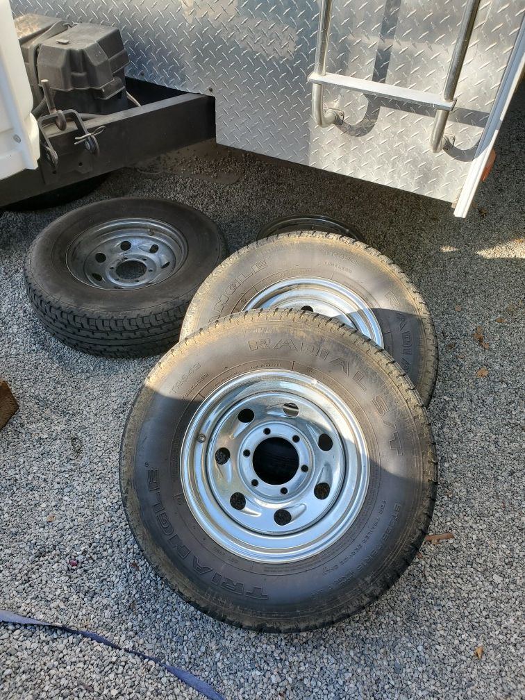COMPLETE SET, 5 RIMS and 3 tire's. Tire size ST225/75R15 perfect for trailers