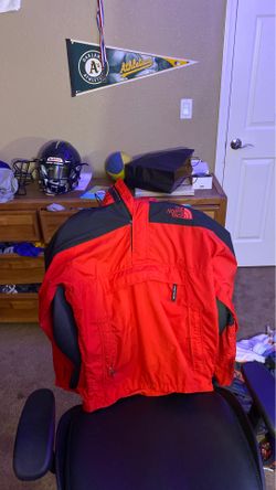 Red north face windbreaker