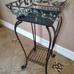 Rod iron decorative plant stand $25.00 see my other offers must pick up cash only no holds