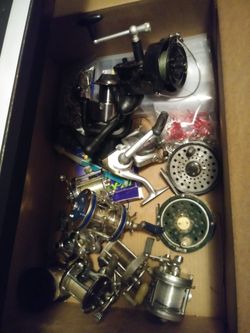 Box of old fishing reels $60