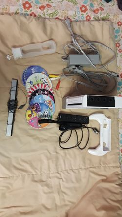 Wii set with 6 games (for little kids) and 1 controller