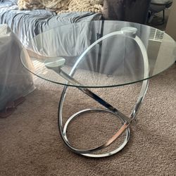 Glass and metal Table