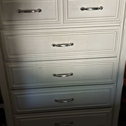 A Dresser And Nightstand