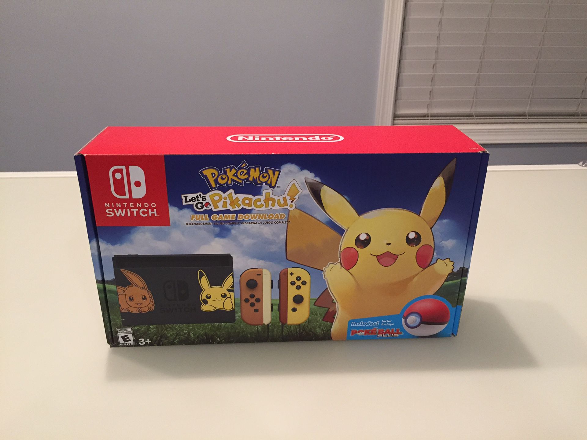 Nintendo Switch Console Bundle - Pikachu and Eevee Edition with Pokemon: Let’s Go, Pikachu! + Poke Ball Plus