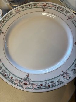 Porcelain set of dishes for 8