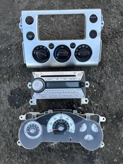 Toyota FJ cruiser dashboard items cluster head unit stereo ac control panel trim 