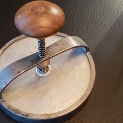 This vintage Androck hamburger press. It is Pat No. RE-24935