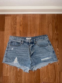 Distressed denim shorts