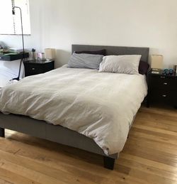 Queen platform upholstered bed gray