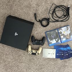 Sony PS4 Pro + 2 Controllers + 2 Games + HDMI