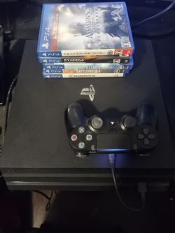 PS4 Pro 1TBwith one controller and games