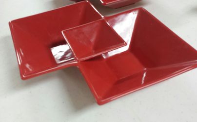 Pair of ceramic red retro ashtray/candy dish.