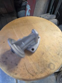 64-76 Pontiac 388 400 angled oil filter housing.