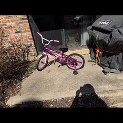 Girl bike with training wheels