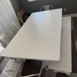 Kitchen table with chairs and bench