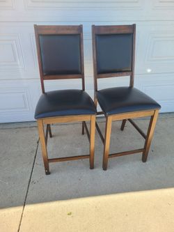 2 high Dining chairs.