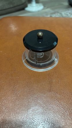 Vintage postage stamp roll dispenser