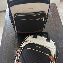 Brand new roller bag with matching smaller bag