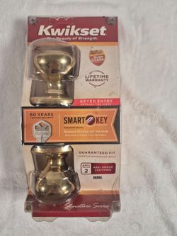 New Kwikset Signature Series Juno Keyed Entry Door Knob (Polished Brass)