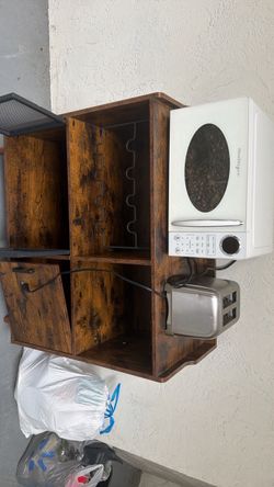Toaster wooden bar and microwave 10 bucks each . solid wooden dresser nine drawers 25 bucks pick up today only Kendyl area by the zoo