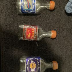 Three bottles. Bills, USC, Lakers