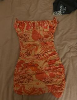 Red and cream floral mini dress, size medium.