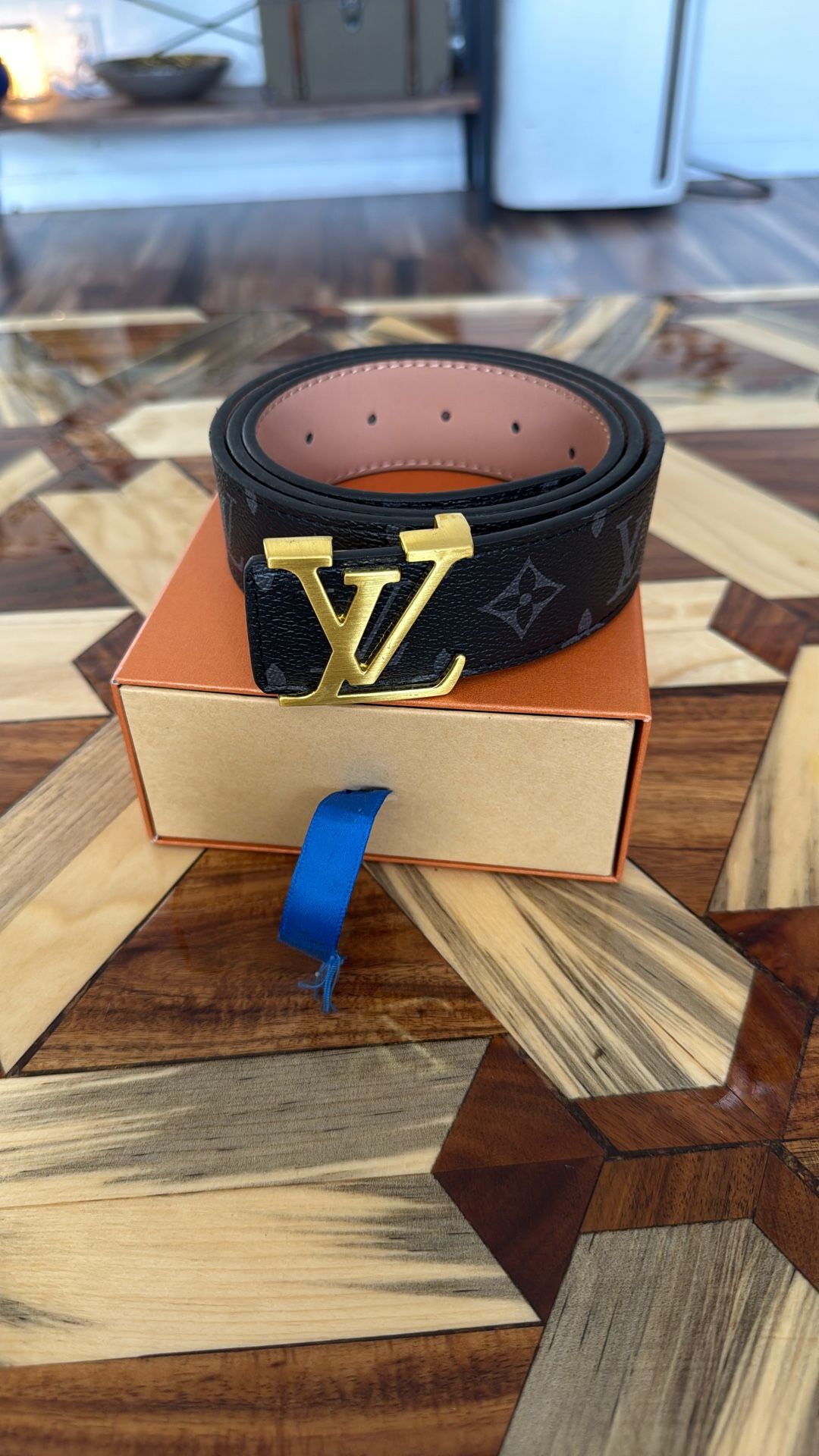 Black Louis Vuitton Belt with Gold buckle