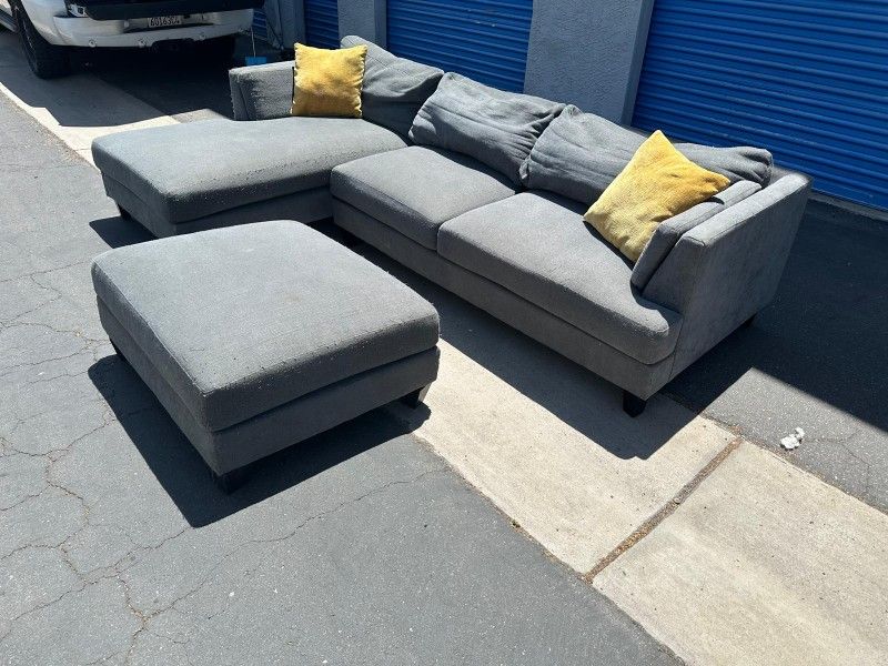 Gray Sectional Couch And Ottoman,