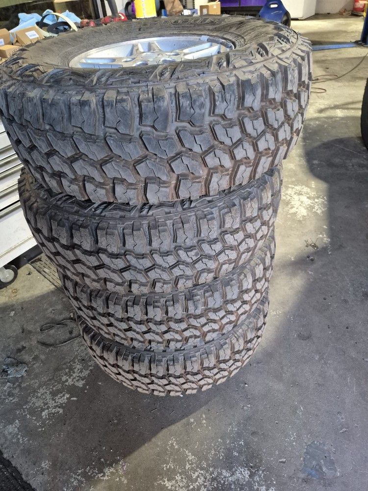 New, Unused LT285/75R16 Tires Americus Rugged Mt On Jeep Wheels