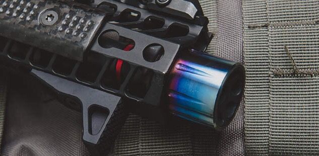 SLR Synergy Linear Hybrid Compensator muzzle break 5.56/.223 Steel Core with Titanium Sleeve Anodized oil slick color Adds 1.52" inches to barrel 1