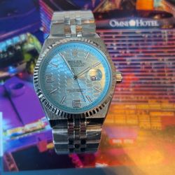 Light blue Land Dweller R**ex Watch