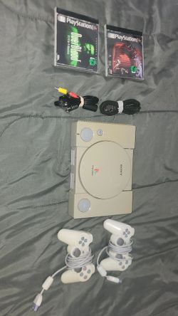 Ps1 W/ Cables and 2 Games
