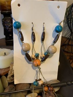 Jewelry set of earrings and necklace