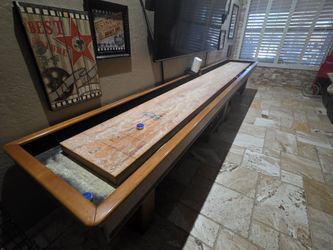 olhausen shuffle board table. 16ft