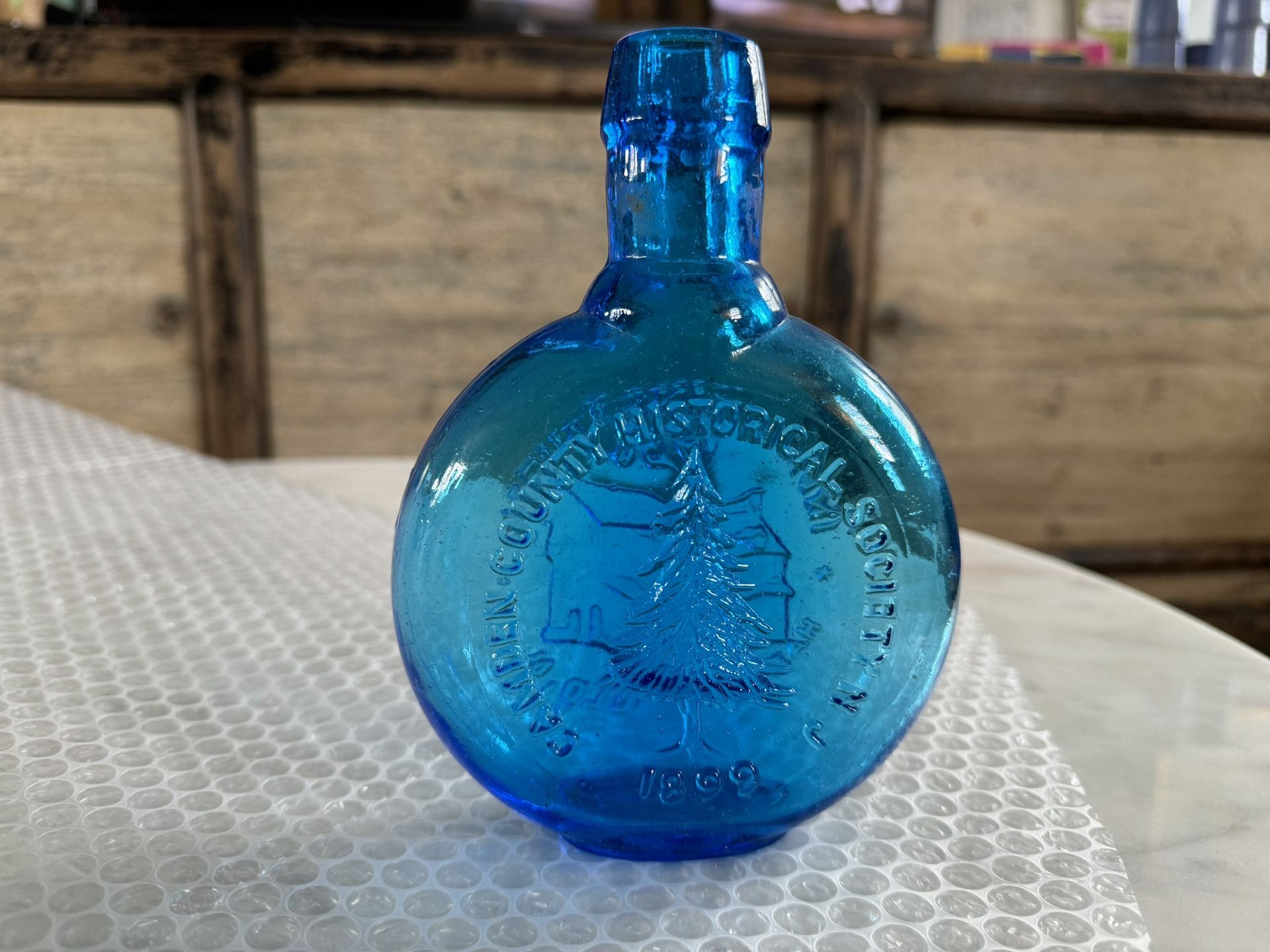 Collectible Glass Embossed Bottle