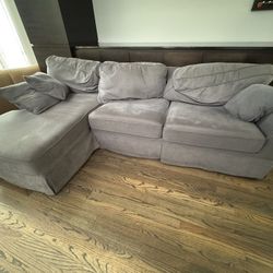 Gray sofa. Turns into Full Size bed.