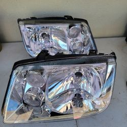 99-05 Volkswagen Jetta MKIV Headlights Luces Micas Calaveras Faros Faroles Focos Headlamps 