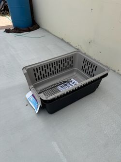 The plastic cage is new. 32X22