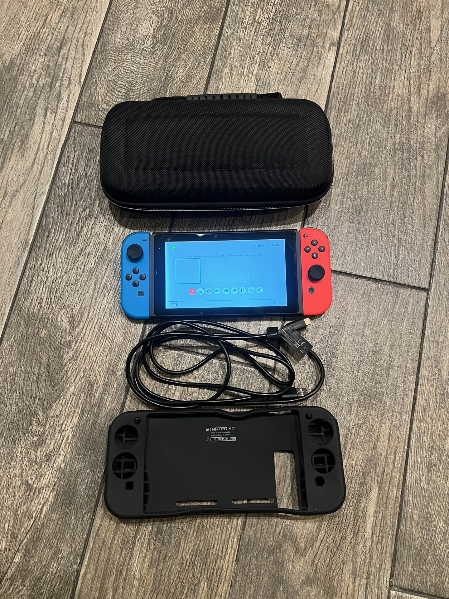 Nintendo Switch Console with Joy Cons and Carrying Case