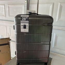 Brand new 28” rolling luggage 