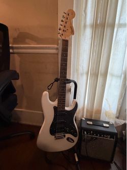 Fender Squire Stratocaster guitar and amp