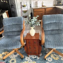 Two Swivel Chairs Upholstered With Table 