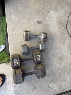 Two sets of dumbbells weights