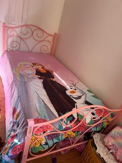Pink twin-size bed