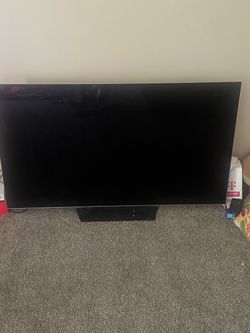 Large Flat Screen TV with Stand