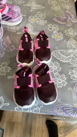 Nike pink and burgundy