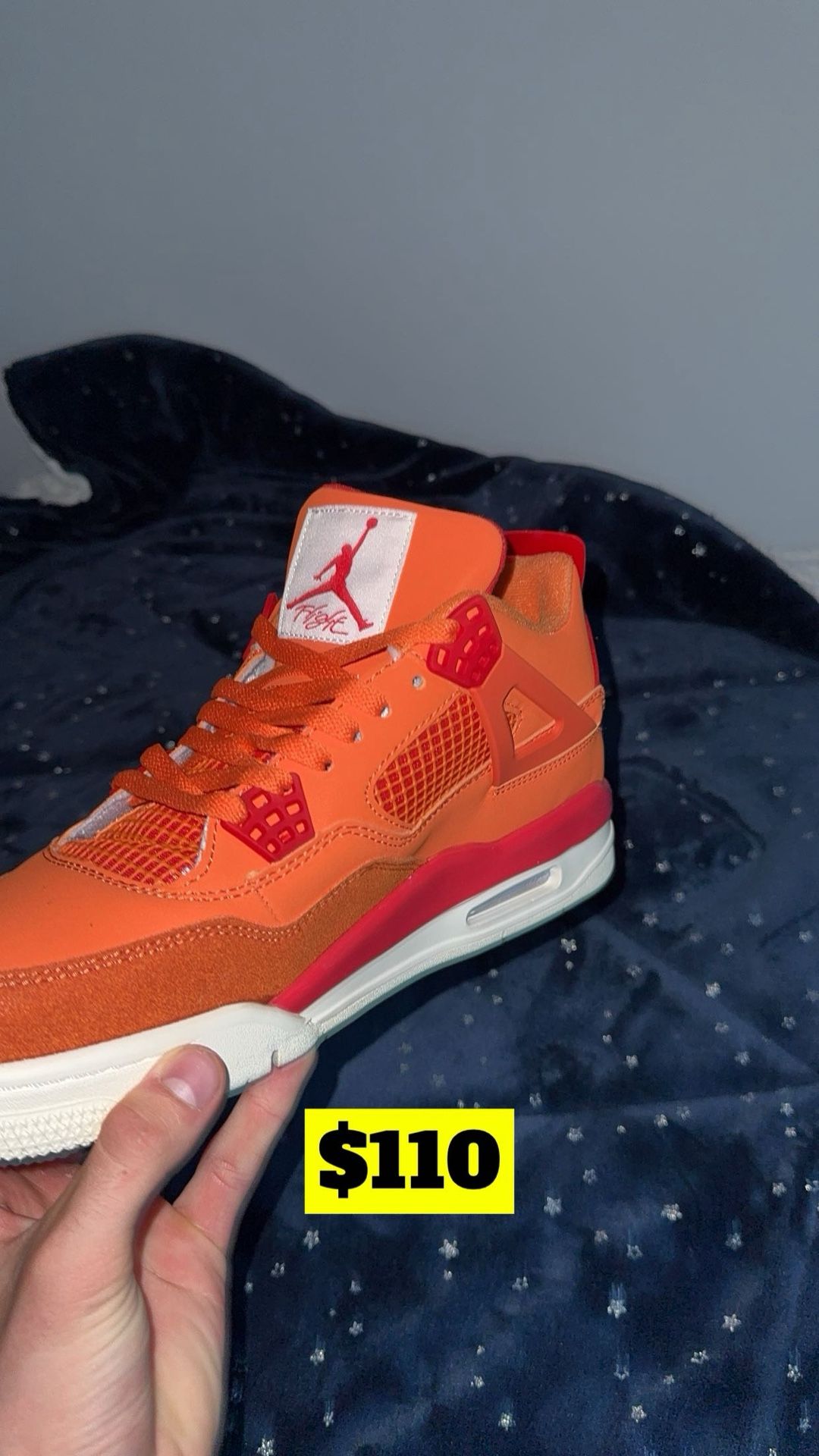 Orange and Red Jordan 4s