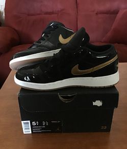 Air Jordan’s black and gold, men’s 5 or women’s 7